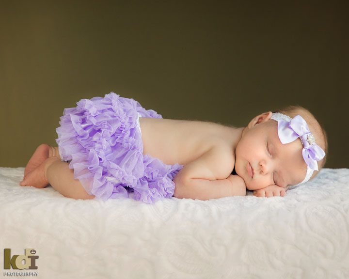 Newborn photography, Flagstaff. Studio portrait of newborn baby girl.