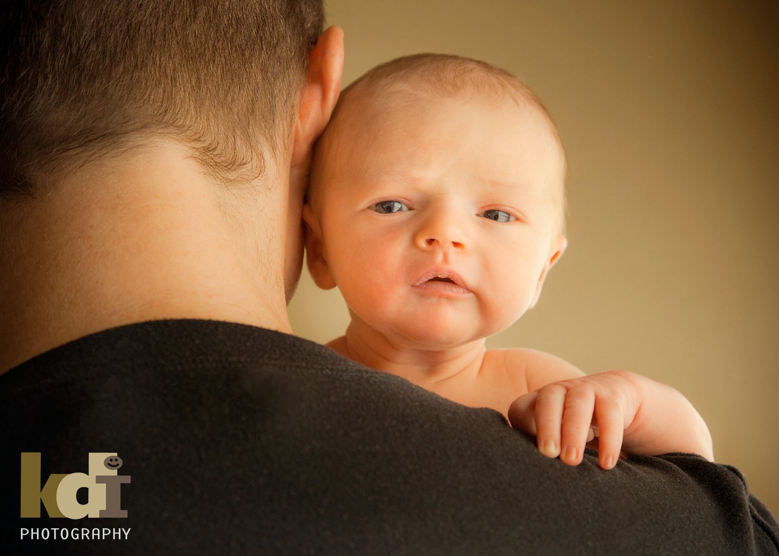 Portrait of Newborn on Dad's Shoulder, Photography Studio in Flagstaff