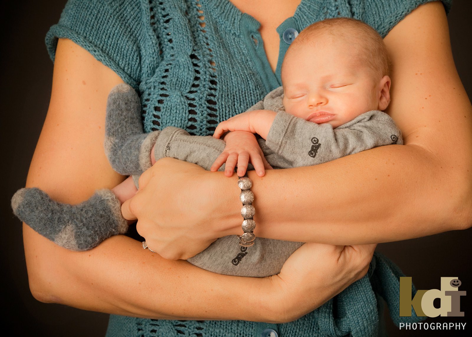 Portrait of Newborn Sleeping in Mom's Arms, Photography Studio in Flagstaff