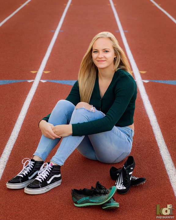 Senior Portrait, High School Girl Sits on Track with Running Shoes, Senior Photo, Flagstaff, AZ