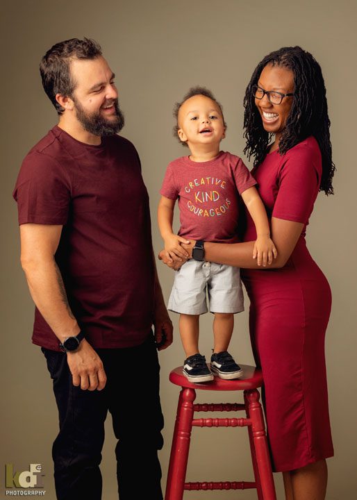 Expecting family laughing, studio portrait, Flagstaff