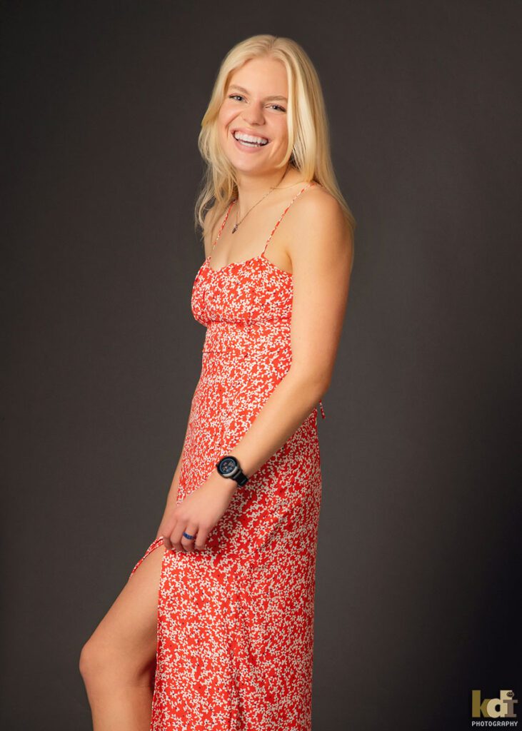 Studio Portrait, Senior Photo Girl in Red Dress, Laughing, Flagstaff, AZ. ©KDI Photography