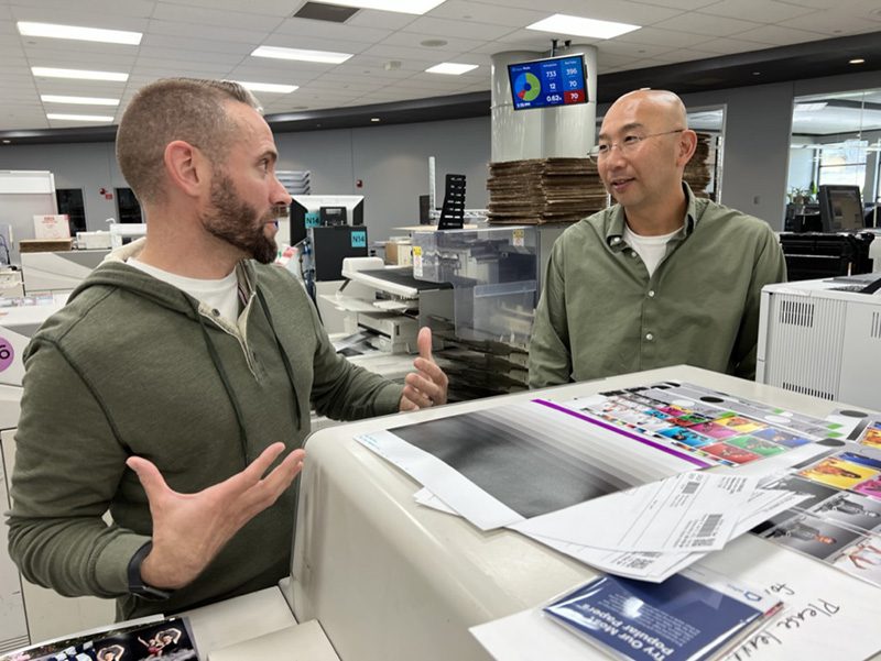Flagstaff photographer, KDI Photography, discuss print calibration at a professional print lab.