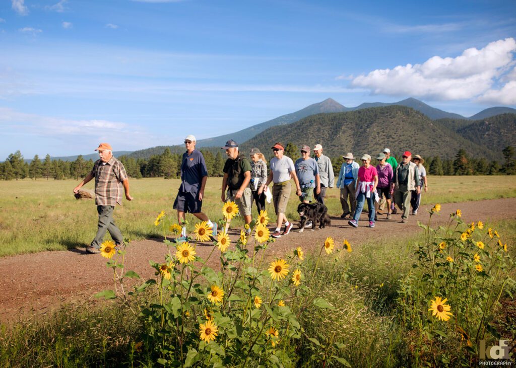 Jack Welch Leads a Walking Group in Buffalo Park, Flagstaff, AZ in 2018. Portrait by KDI Photography.