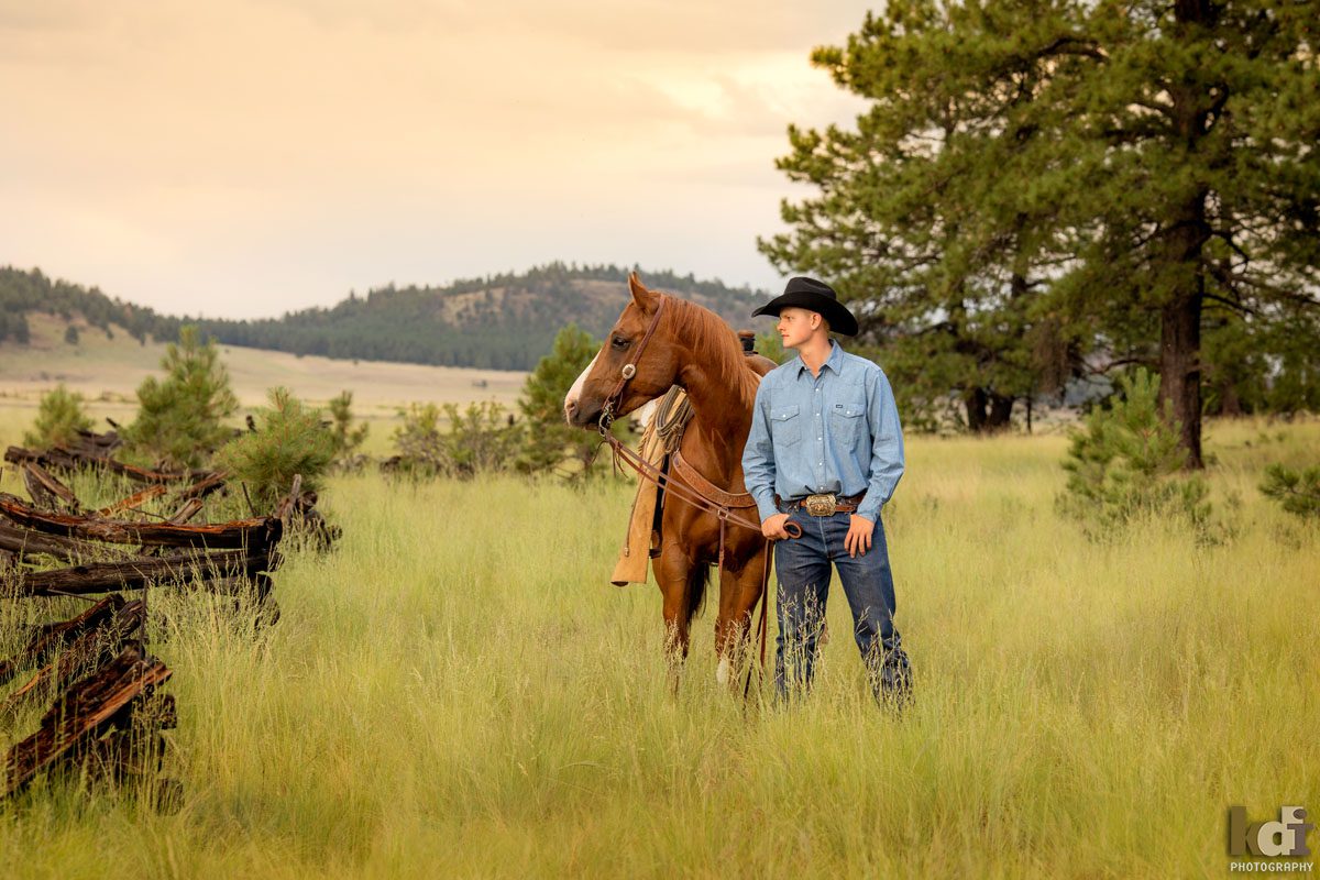 Senior portrait of cowboy with horse in the mountains of Flagstaff, AZ, KDI Photography
