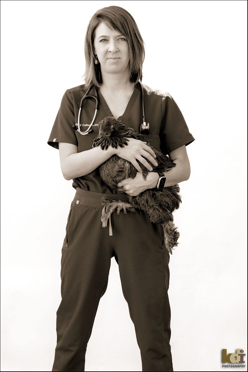 Black and White Portrait of Veterinarian Holding Chicken in Flagstaff AZ, by KDI Photography