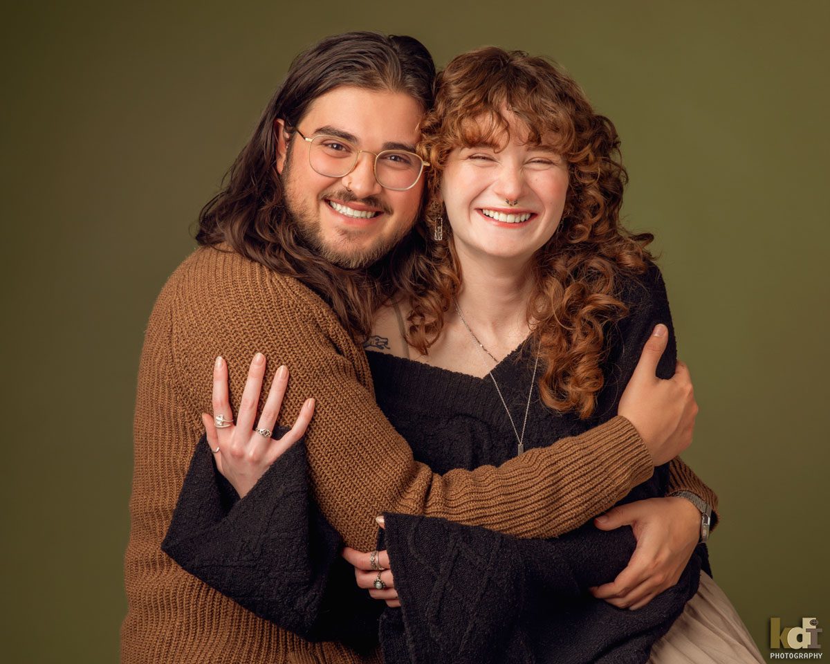 A Young Couple Hugs in Studio Portrait in Flagstaff, AZ by KDI Photography, Flagstaff Family Photographer