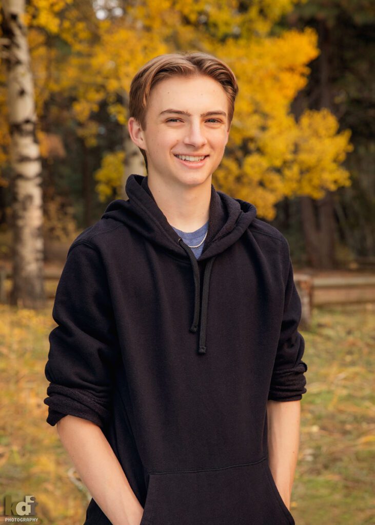 High School Senior Boy, Standing in Colorful Fall Aspen Trees, Senior Photos in Flagstaff, AZ by KDI Photography, Senior Photographer