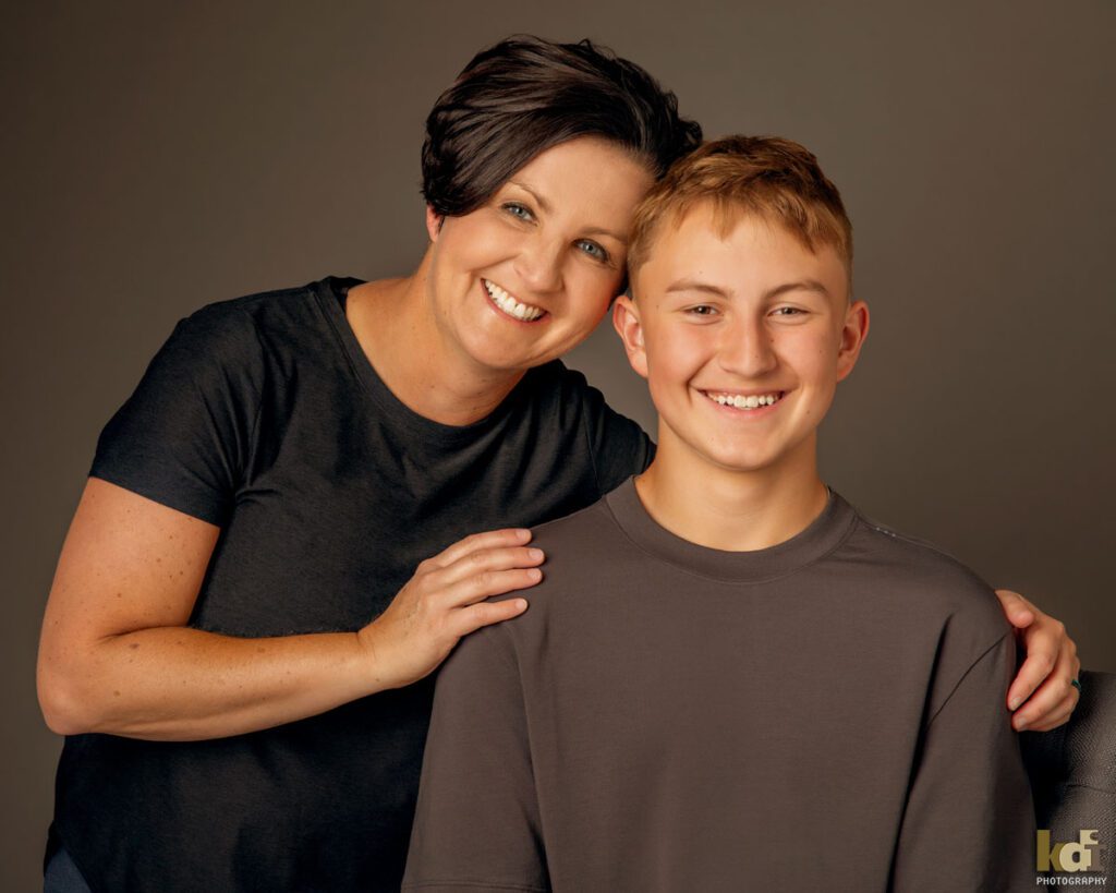 Mother and Teen Son Hugging, Family and Kids Portrait Photographer in Flagstaff, AZ by KDI Photography 