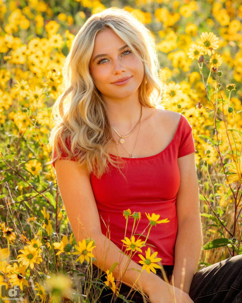Senior Portrait of a Girl in Red Shirt in a Field of Wildflowers Outside of Flagstaff, AZ, Location Portraits by KDI Photography